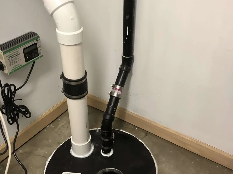 Sealed sump suction point on a radon mitigation system